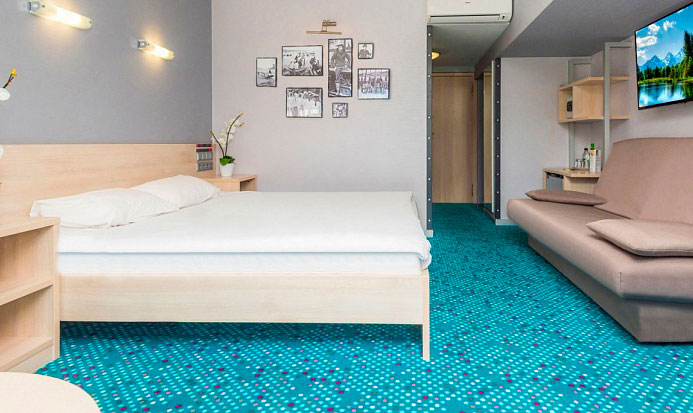 Стандартный улучшенный 3-местный с двуспал.кроватью и диваном