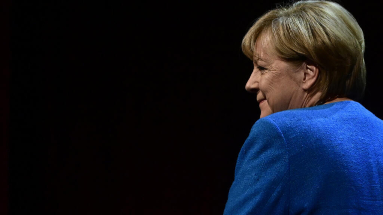 Angela Merkel defends open-door migrant policy, ties with Russia in new memoir