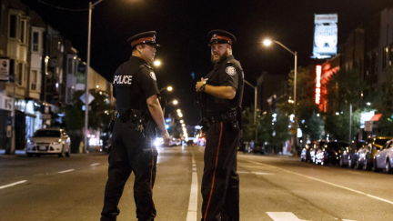 At least 12 people wounded in Toronto pub shooting, suspect at large