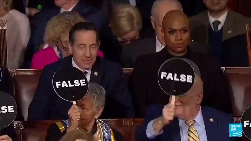 Empty seats, signs: Democrats protest during Trump's address to Congress