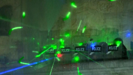 Lasers and fireworks: Weapons of choice for Georgia protesters