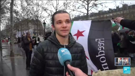 Parisians gather to celebrate the fall of Assad's regime in Syria