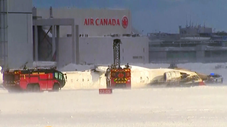 Plane flips on landing at Toronto airport, injuring 17