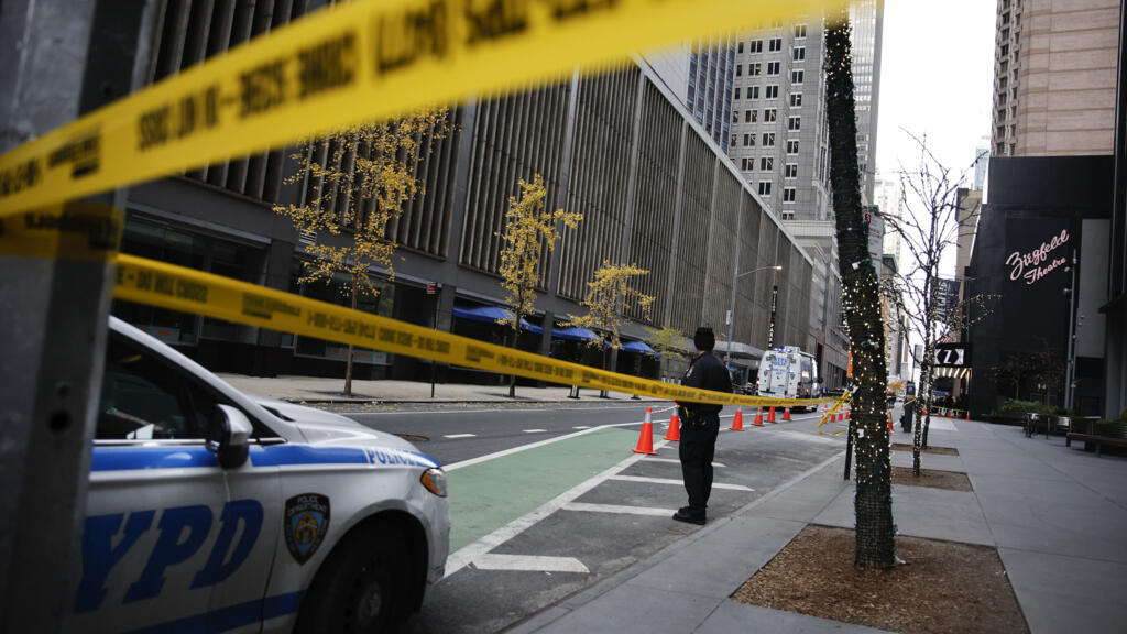 Police hunt for US healthcare executive's masked killer after New York attack