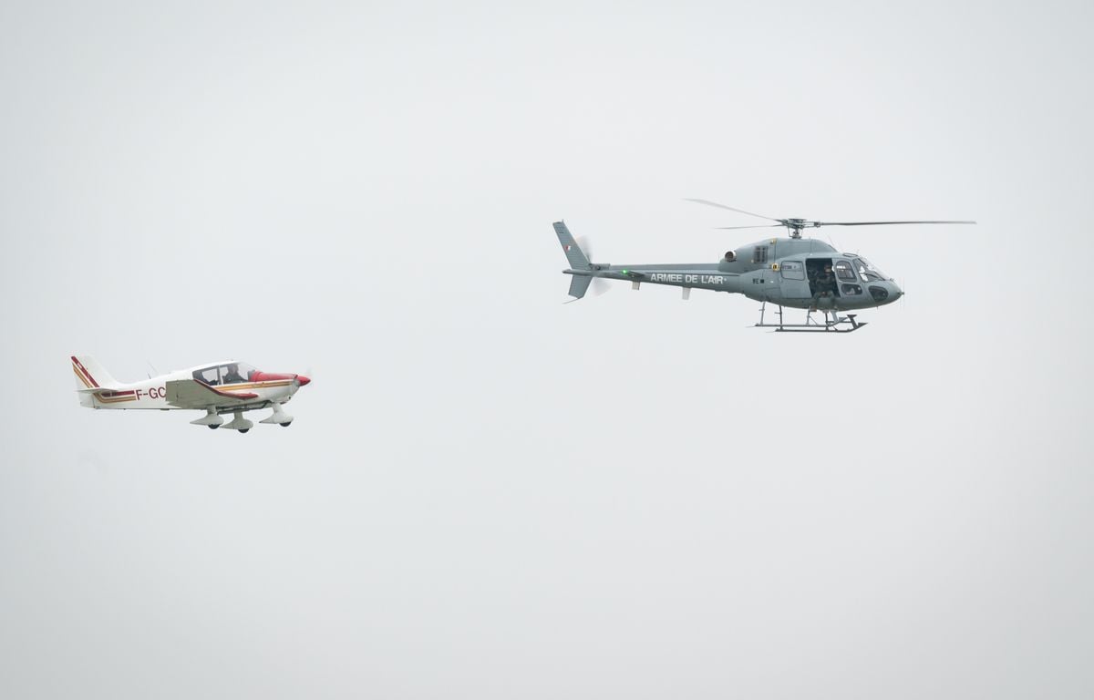 **Rewritten title:**

Des avions de chasse et des hélicoptères de l'armée de l'Air au secours de deux pilotes perdus au nord de Paris

**French translation:**

Avions de chasse et hélicoptères de l'armée de l'Air au secours de deux pilotes "en perdition" au nord de Paris