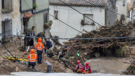 Spanish rescuers race to save flash flood victims as death toll tops 90