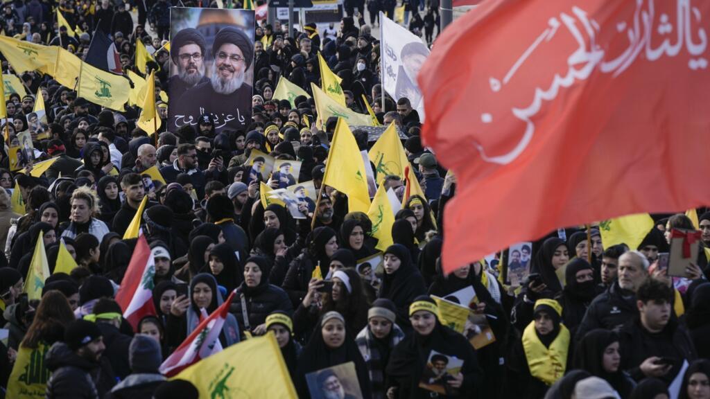 Thousands of mourners flock to funeral of slain Hezbollah leader in Beirut