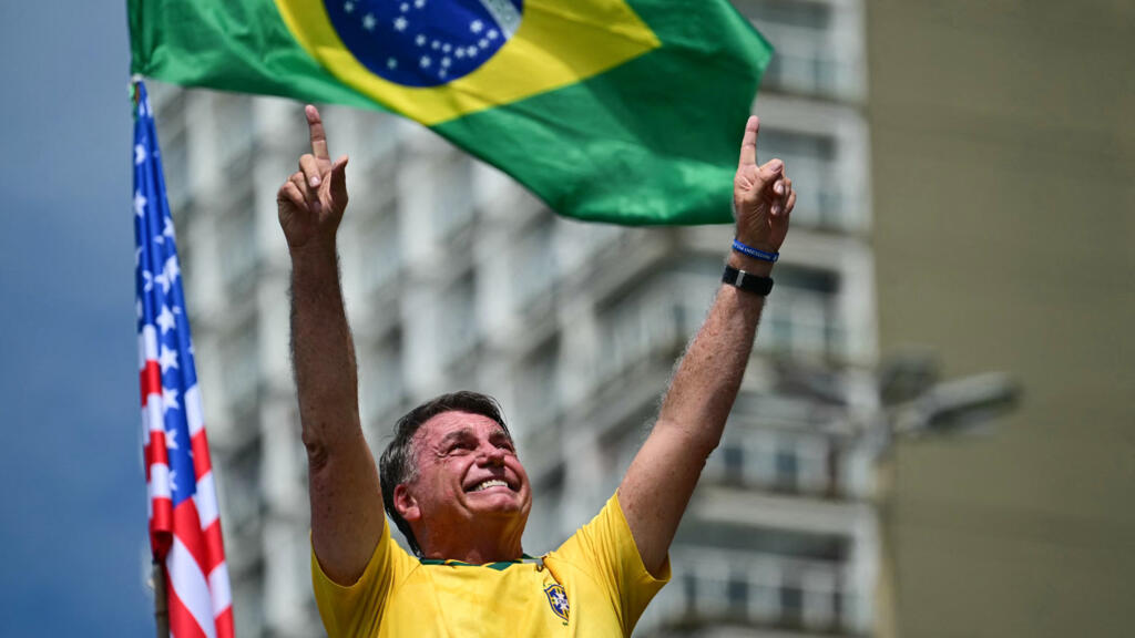 Thousands rally for Brazil's ex-president Bolsonaro as he faces coup charges