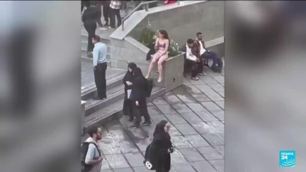 Woman strips off clothes at Iran university in apparent protest